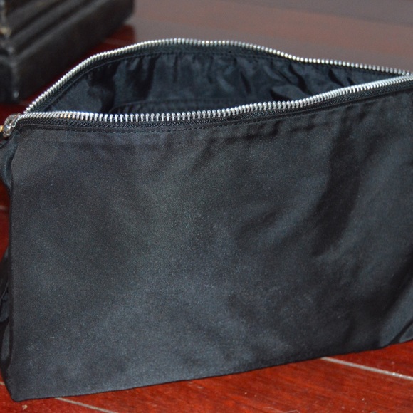 M.A.C. Medium nylon cosmetic case.