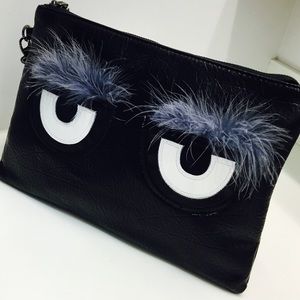 SOLD!  MONSTER" CLUTCH