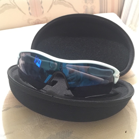 Baby blue Oakley's with case