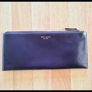 Kate Spade dark purple leather accessories pouch