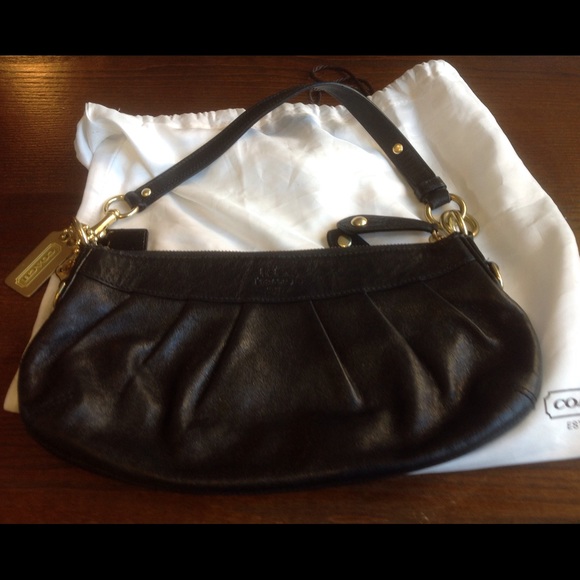 Leather coach purse in duster bag