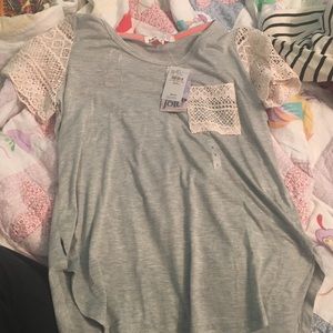 Grey t shirt with cream lace see thru sleeves