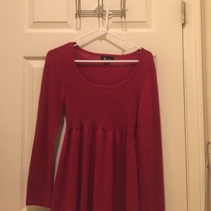 Red silvery sweater.