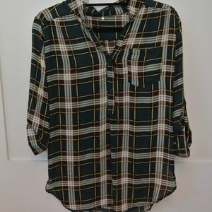 Green flannel patterned shirt