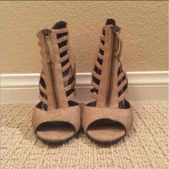 Elizabeth and James gold heels
