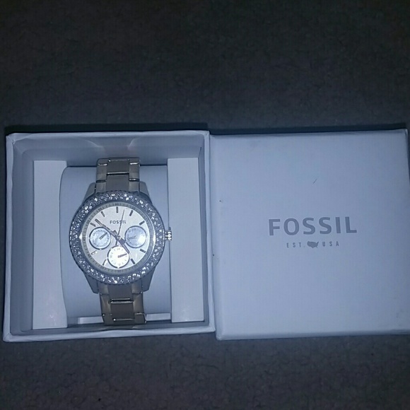 Gold Fossil watch brand new with tags.