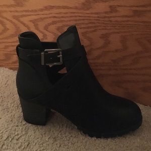 Brand new black heeled booties