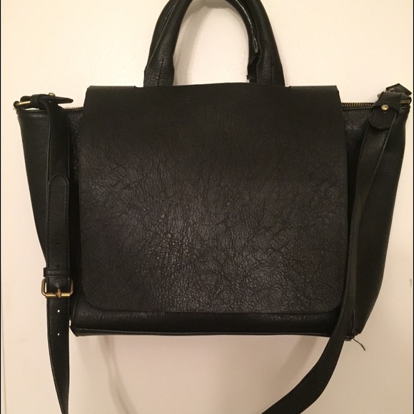 Trafaluc leather bag. Multiple straps and handles.