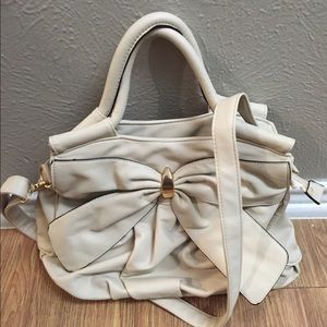 Cream bow purse