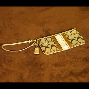 Coach gold wristlet