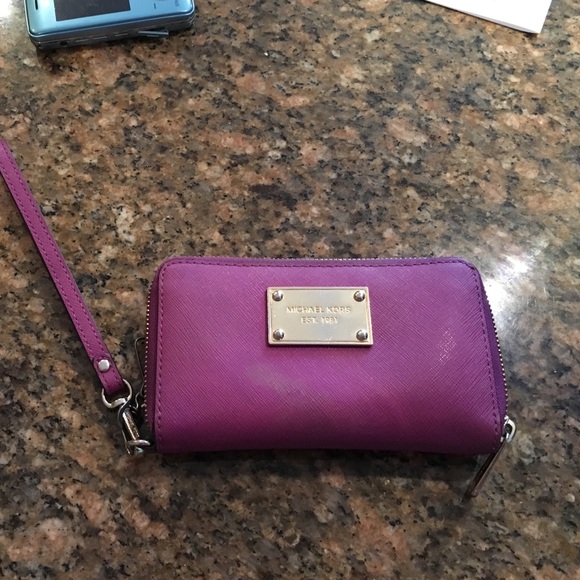 Michael Kors large jet set wristlet.