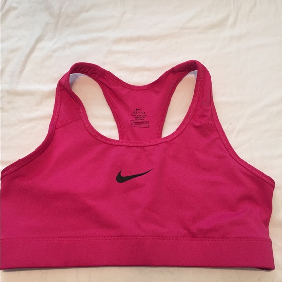 3 size medium Nike Dri-Fit sports bras.