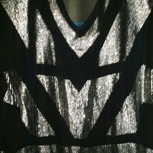 Black and silver shirt. No name!