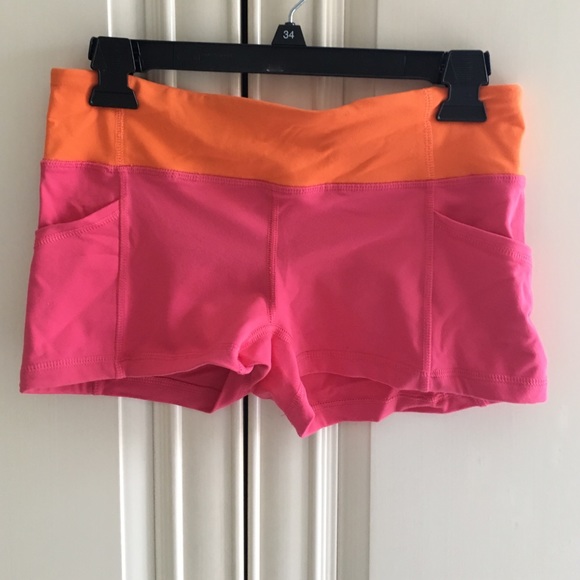 Orange and pink spandex shorts
