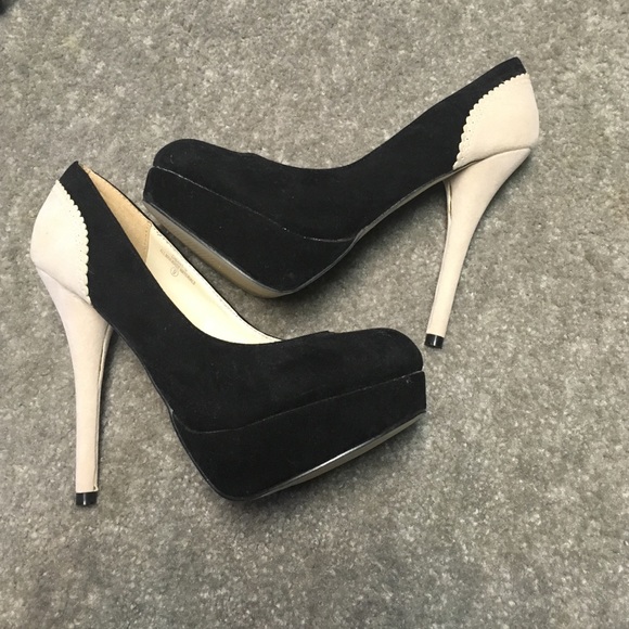 Black and beige pumps