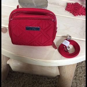Small red wristlet, new without tags.