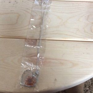 Heart necklace with flower