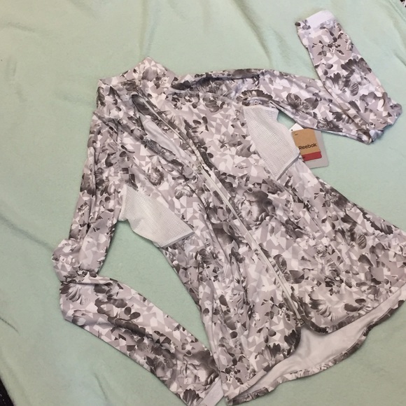 Reebok zip up with geometric floral pattern+mesh