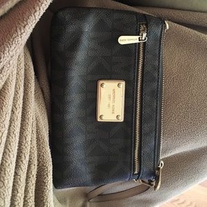 Used MK Wristlet.