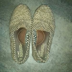 Toms gold and brown shoes