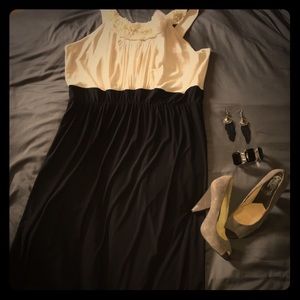 Elegant blck & cream dress w/embellished neckline