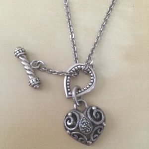 Sterling silver necklace and charm.