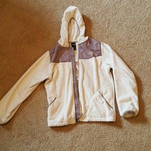 White fuzzy North Face jacket