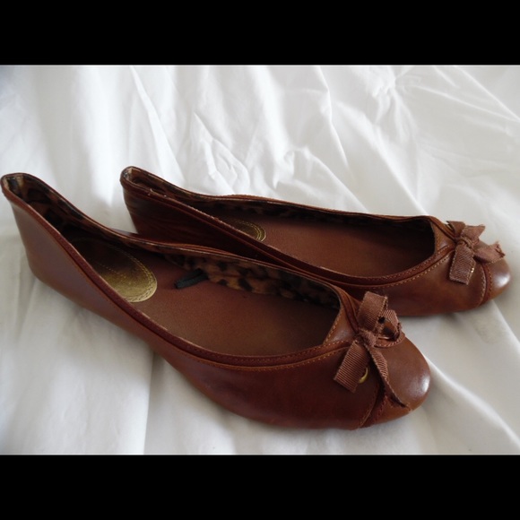 Brown flats with bow tie