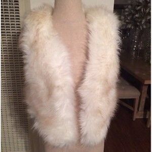 White faux fur vest