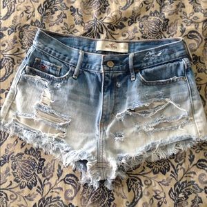 High-waisted destroyed denim shorts