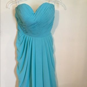 Teal/mint bridesmaid dress.