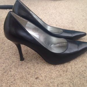 Pointed black heels
