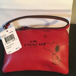 Authentic  coach  x peanut wristlet