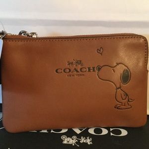 Authentic coach xpeanut wristlet