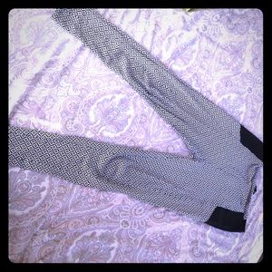 US size 8 black and white patterned leggings.