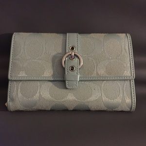 Small COACH wallet. Light baby blue. Slightly used