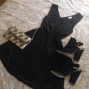 Cute Tobi mini with gold studs and cut out back