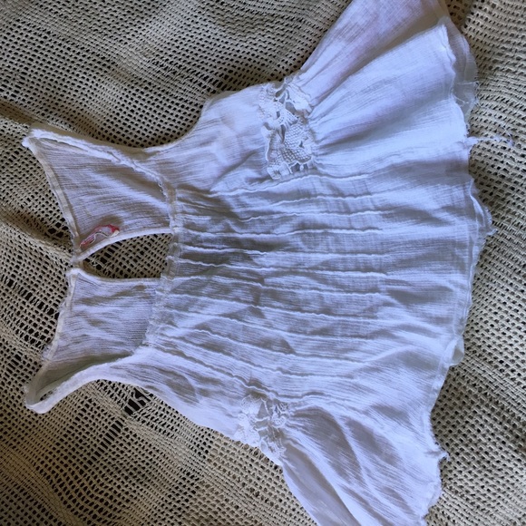 White Free people tank top.