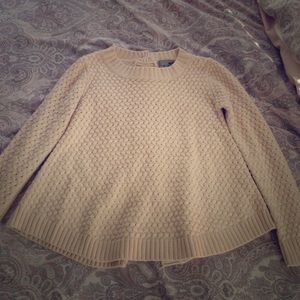 Pale pink knit sweater with cute buttons at back