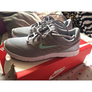 Nike Shoes color is in wolf grey.