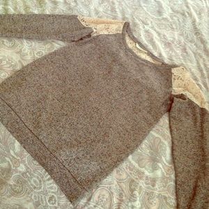 Adorable sweater with delicate pink lace detail