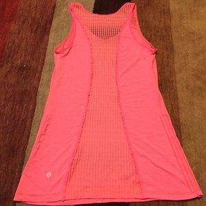 Lululemon workout top with detailed open back.