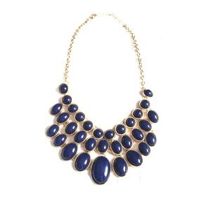 Charming Charlie Blue and gold circle necklace