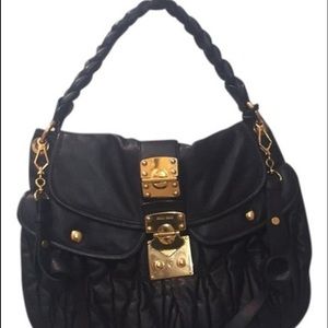 Miu Miu hobo bag with gold detailing