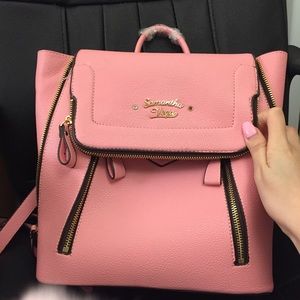 a pink cute backpack wore it once