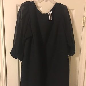 Black textured cocktail dress with sheer sleeves