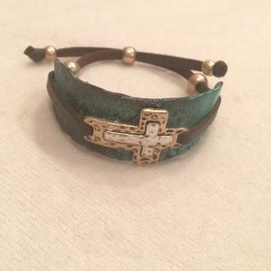 Metal cross braclet with tie strings and beads