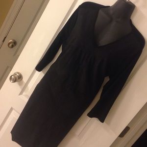 Black knee length dress. Faux suede front.