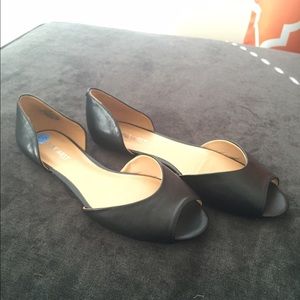 Black Nine West flats.