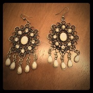 White and silver earrings